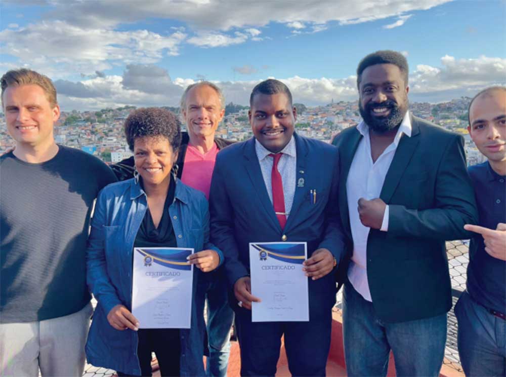 Business owners receiving certificates