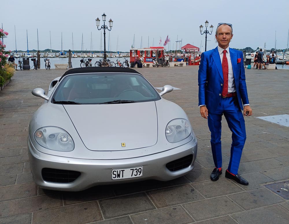 Jon Malmsäter standing by a car